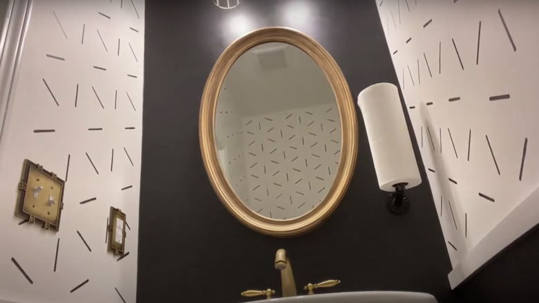 funky bathroom with patterned walls