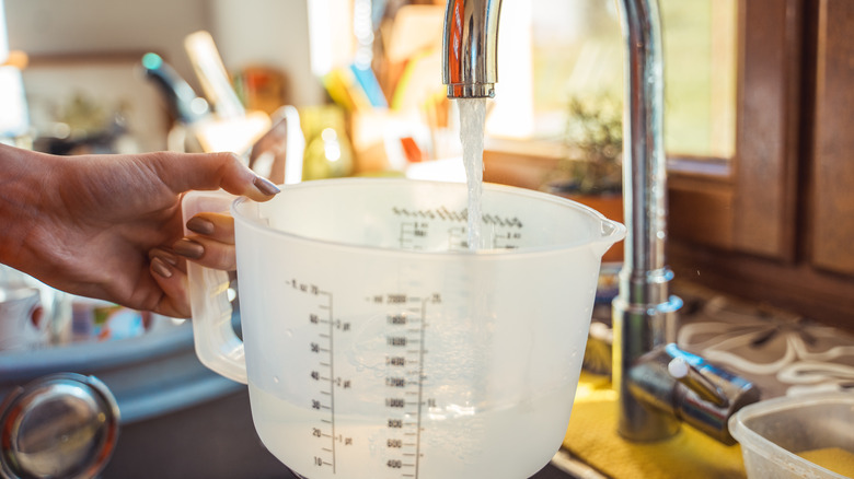 measuring cup with water