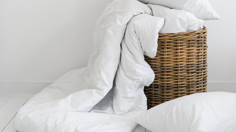 Duvet and linens in basket