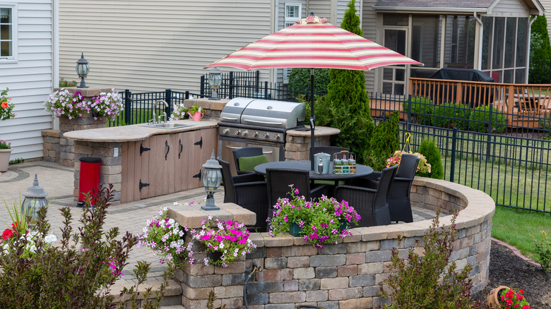 decorated patio area with umbrella