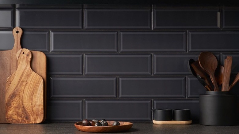 Black beveled subway tile