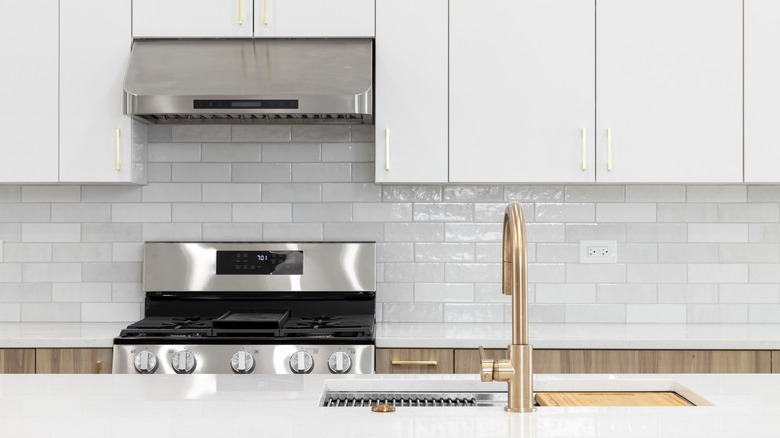 White subway tile and cabinets