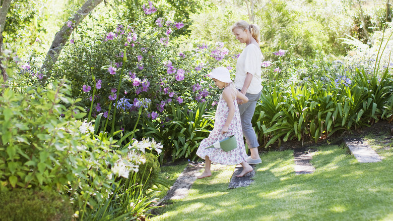 mother and daughter in garden