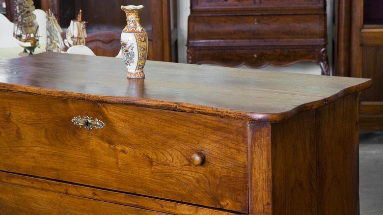 Wood dresser with imperfections 