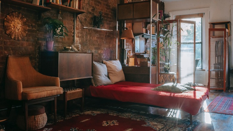 Living room with bed and chair