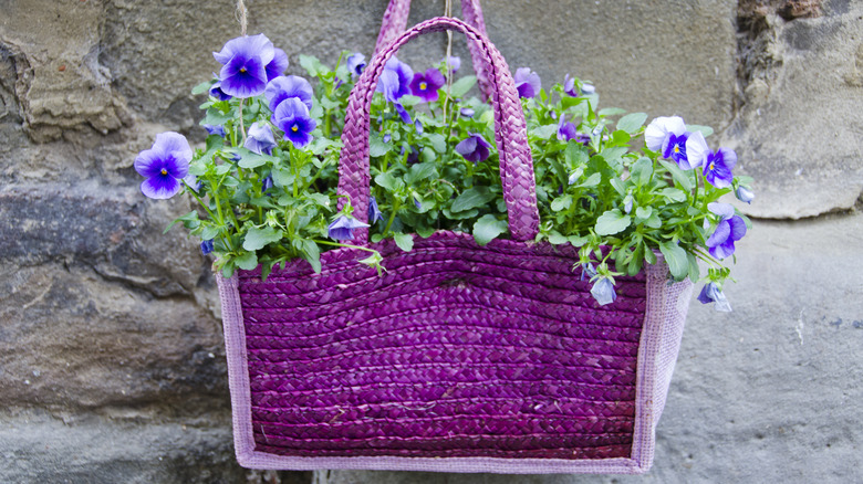 Purse planter with flowers