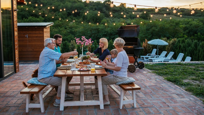 People sitting outside eating