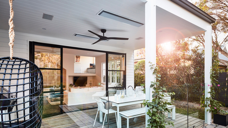 Roofed deck with ceiling fan