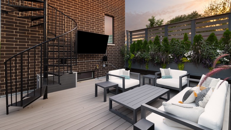 Outdoor seating area with television
