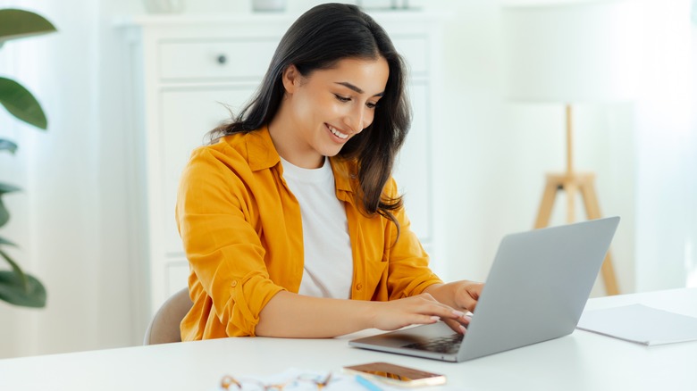 Woman enjoying working from home