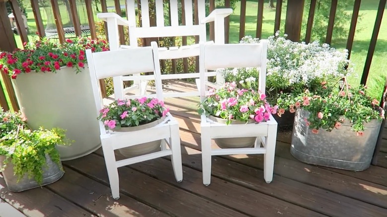 two wooden chair planters