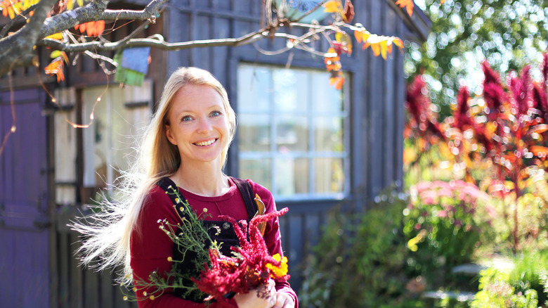 Woman with garden home shed