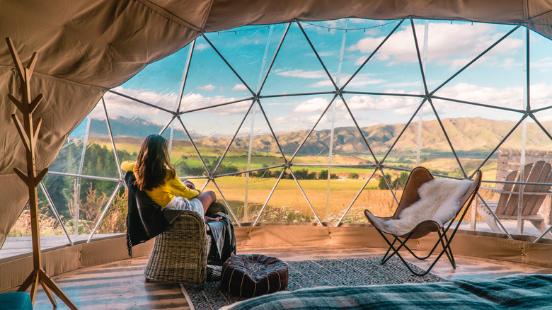 woman in geo dome tent