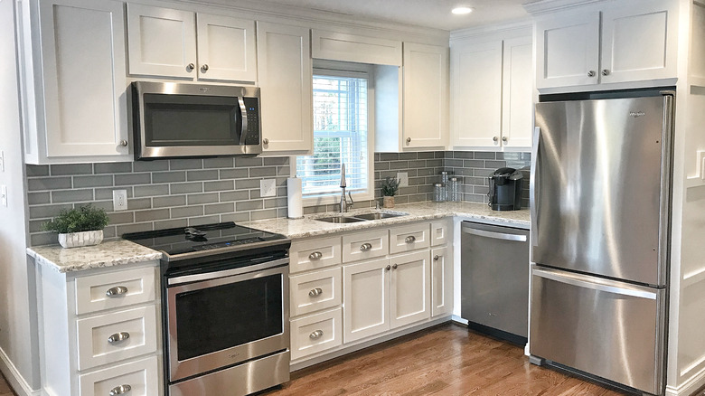 Small kitchen with silver finishes