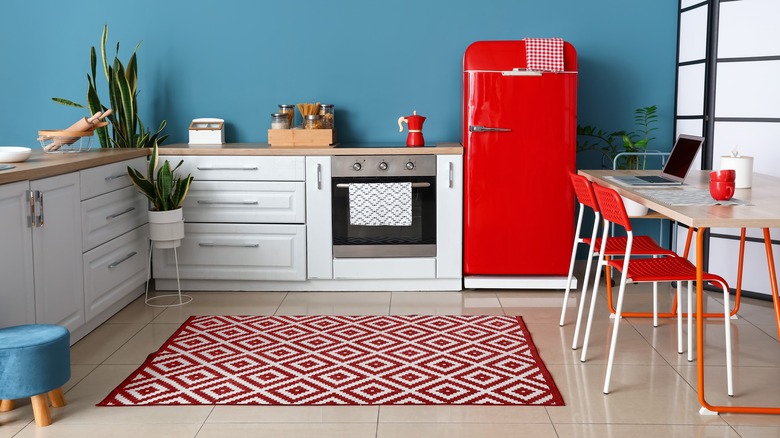 Kitchen with large area rug