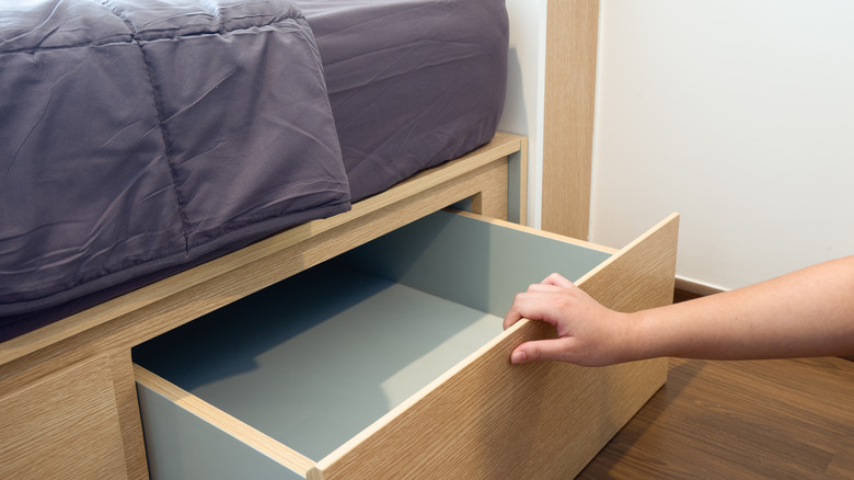 bed with drawer in the bottom