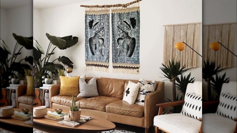 Pair of tapestries over a sofa