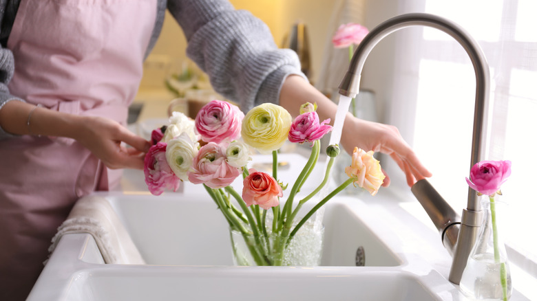 watering a bouquet