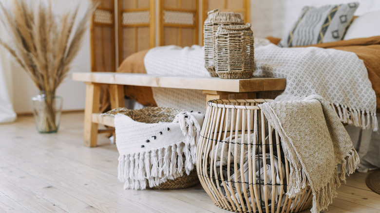 wooden basket by bed