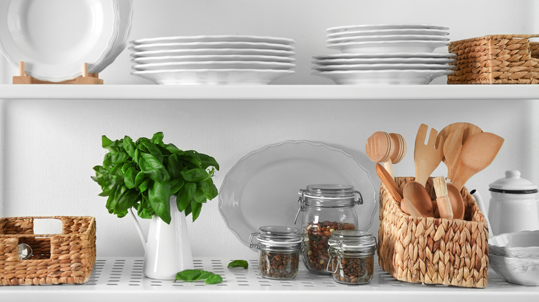 wooden kitchenware in baskets