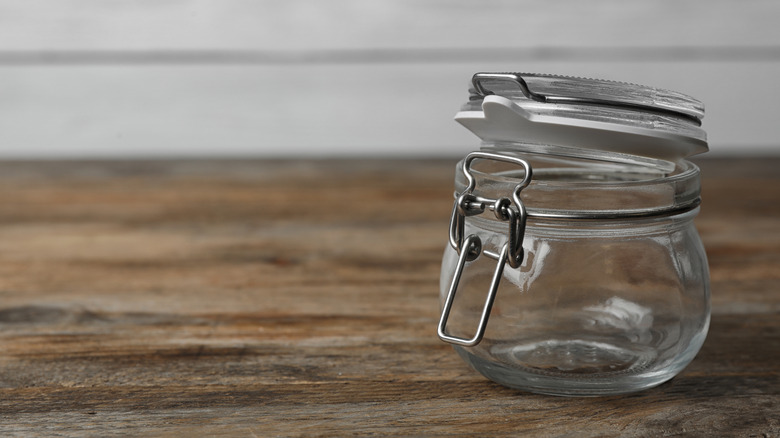 Photo showing empty clamp lid jar on table