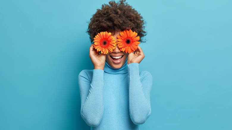 orange daisies pretty girl laughing