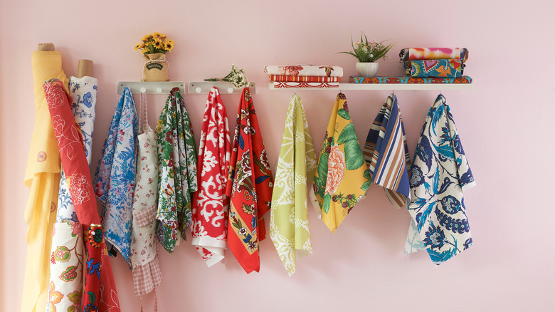 colorful scarves hanging on wall