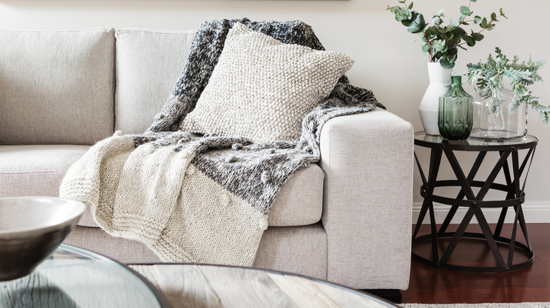 neutral throw on sofa 