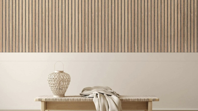 Fluted wood paneling along upper part of wall
