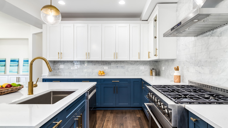 white kitchen with gold hardware