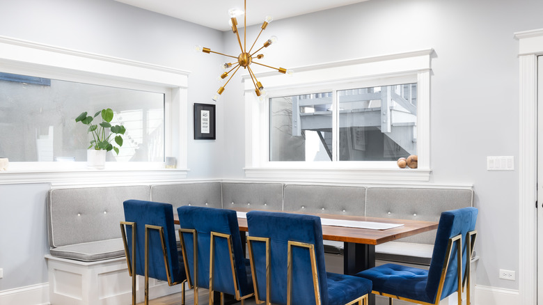 dining area with blue chairs