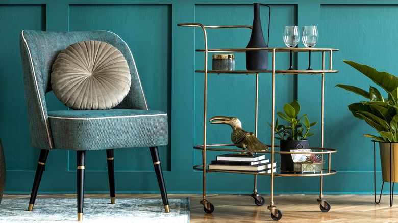 gold bar cart with glasses