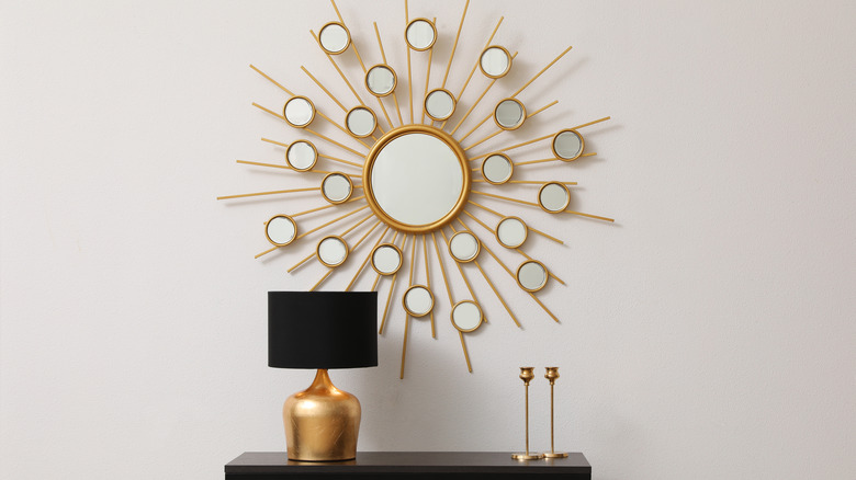unique gold mirror and table