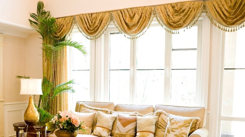 gold drapes window treatments