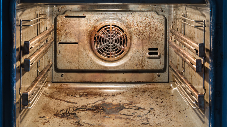 Dirty oven covered in grease