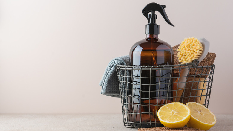 spray bottle next to lemons