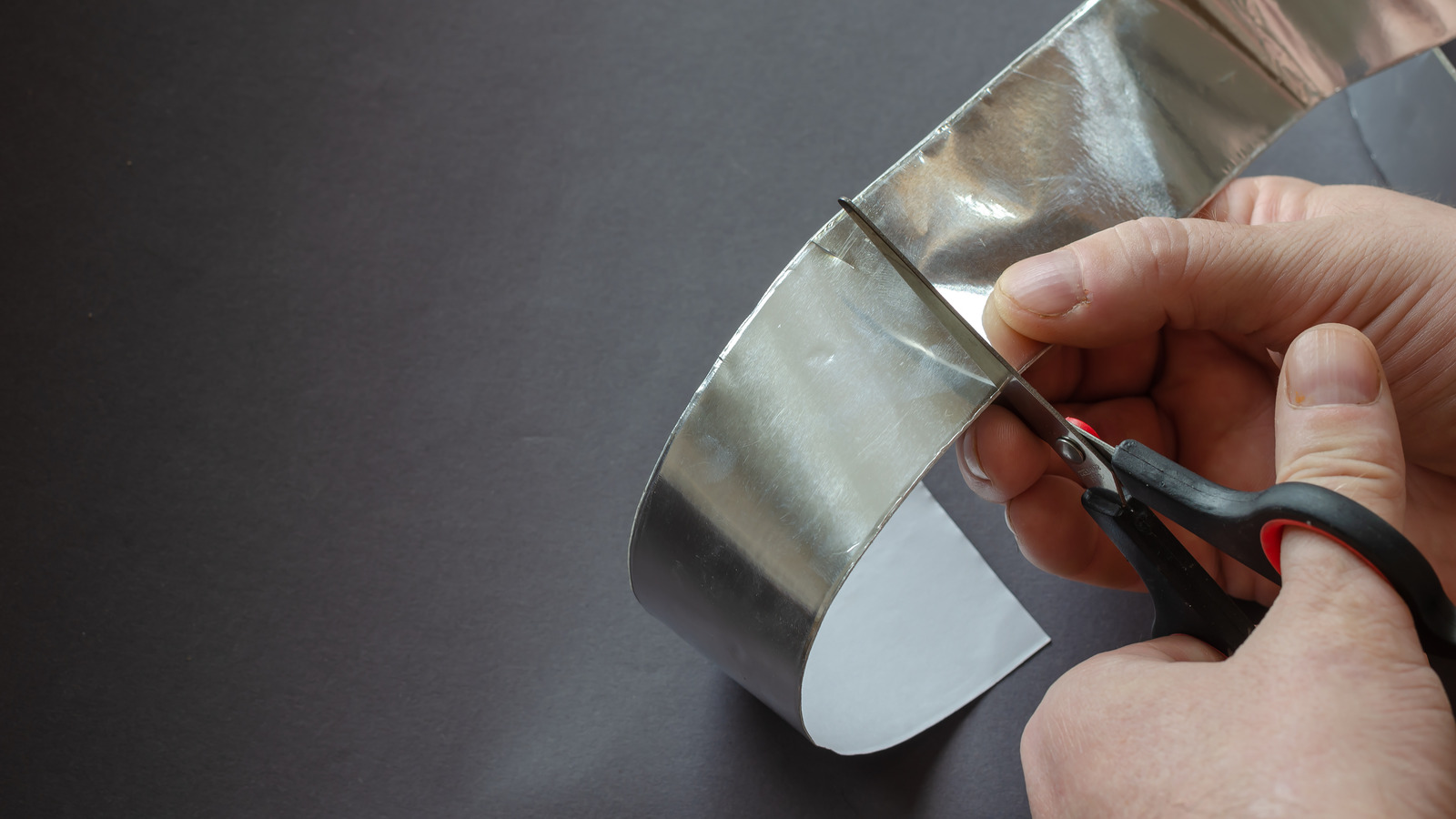 How To Use Peel-And-Stick Metal Trim To Elevate Your Living Room