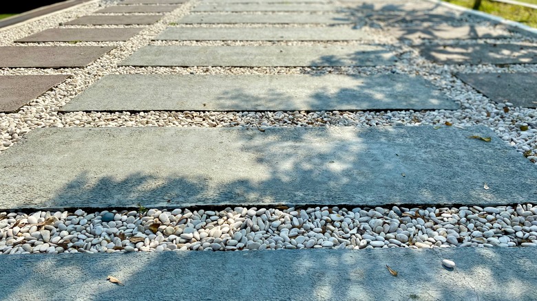 walkway with pavers and pea gravel