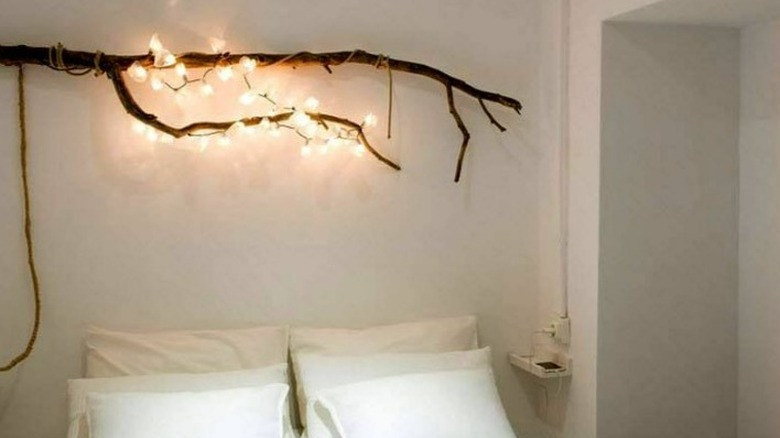 Wall mounted tree branch with lights
