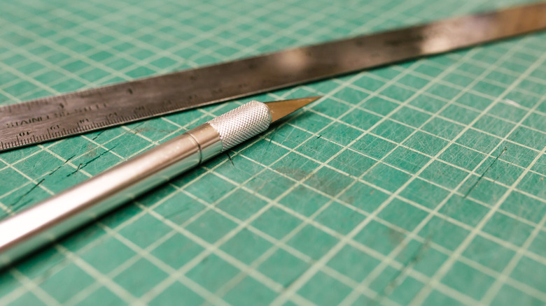 X-Acto knife and ruler