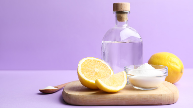 cutting board with cleaning ingredients