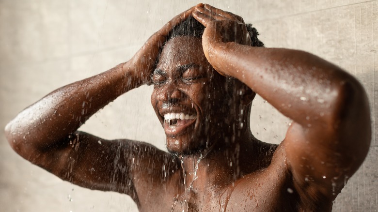 man taking shower