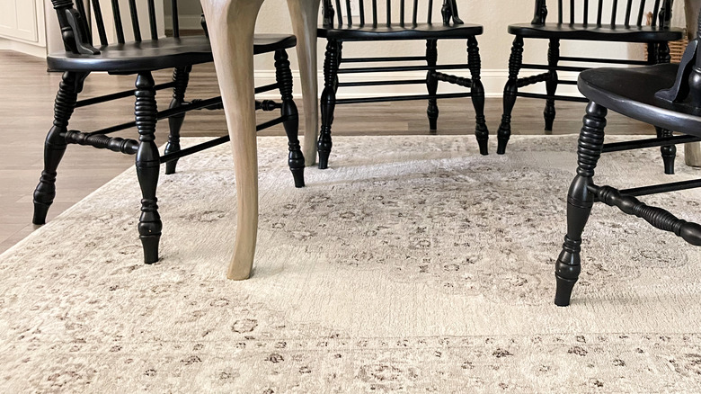 patterned rug on wood floor