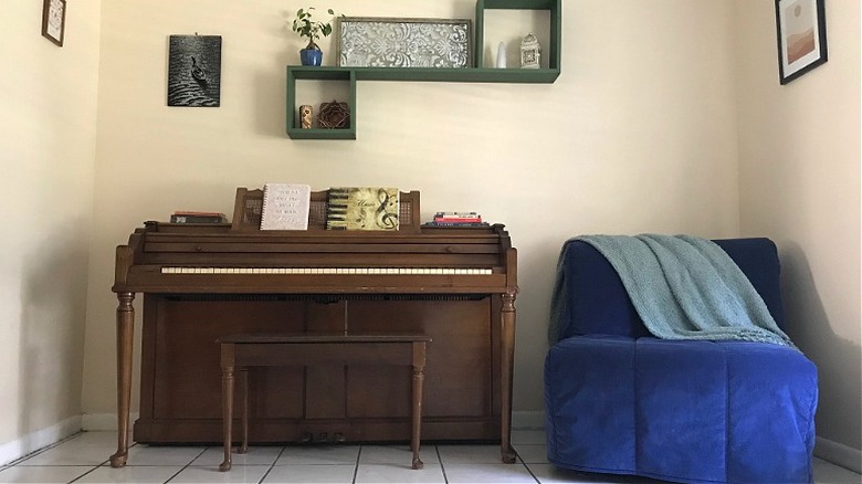 Blue chair and piano