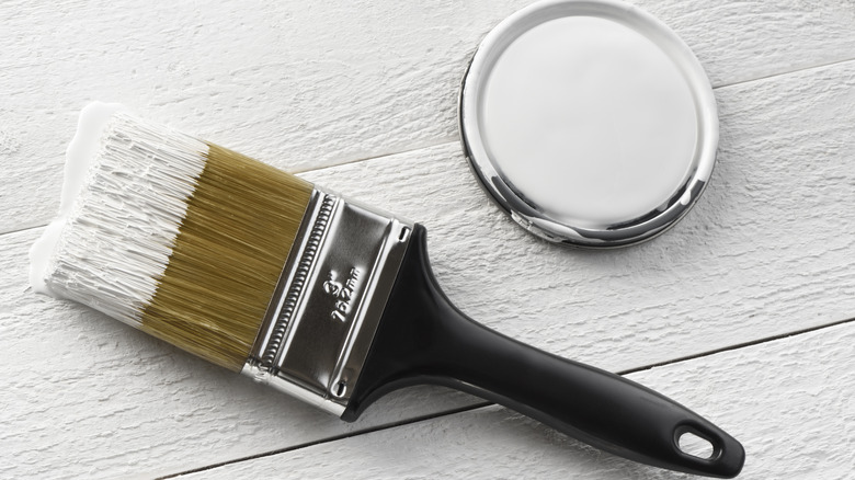 paint brush with white paint