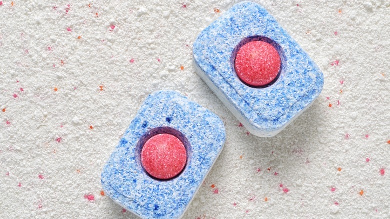 Closeup of two dishwasher tablets