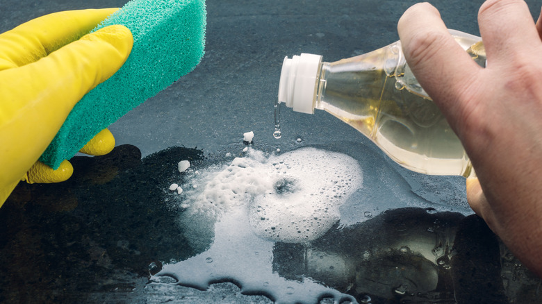 Adding vinegar to baking soda