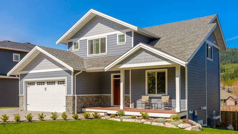 house with green lawn