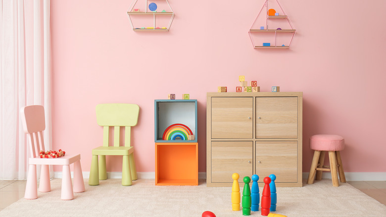 pink playroom with chairs