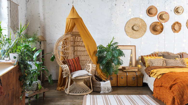 houseplants in bohemian concrete bedroom